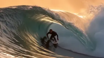 Text to video AI free without watermark — surfer inside a barrel wave, Wan 2.7